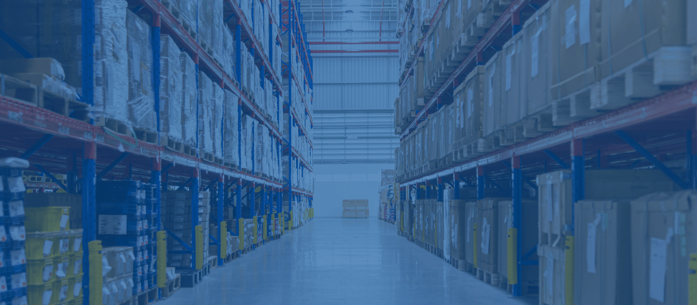 Banner image of a wholesale warehouse filled with various cleaning products.