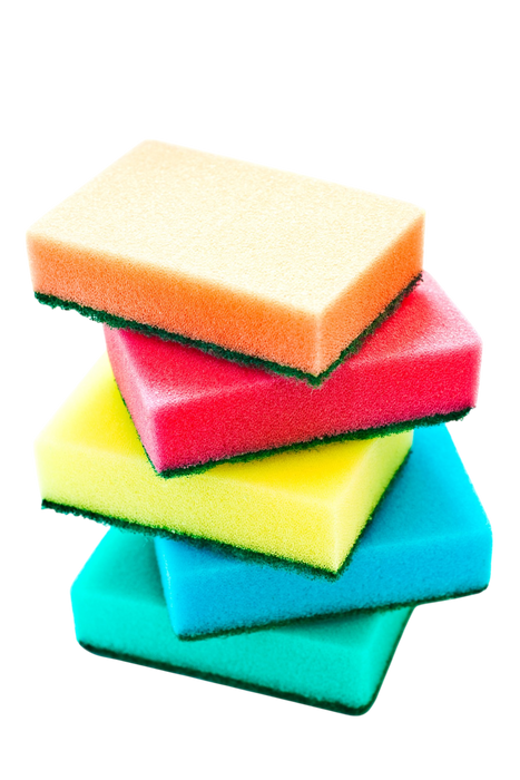 Stack of colorful sponges on a white background