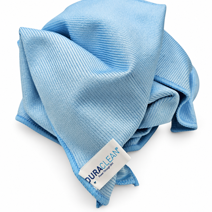 Blue glass polishing cloth laid flat